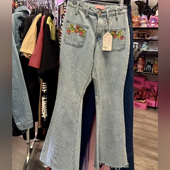 Super desired strawberry shortcake × dolls kill flared denim jeans